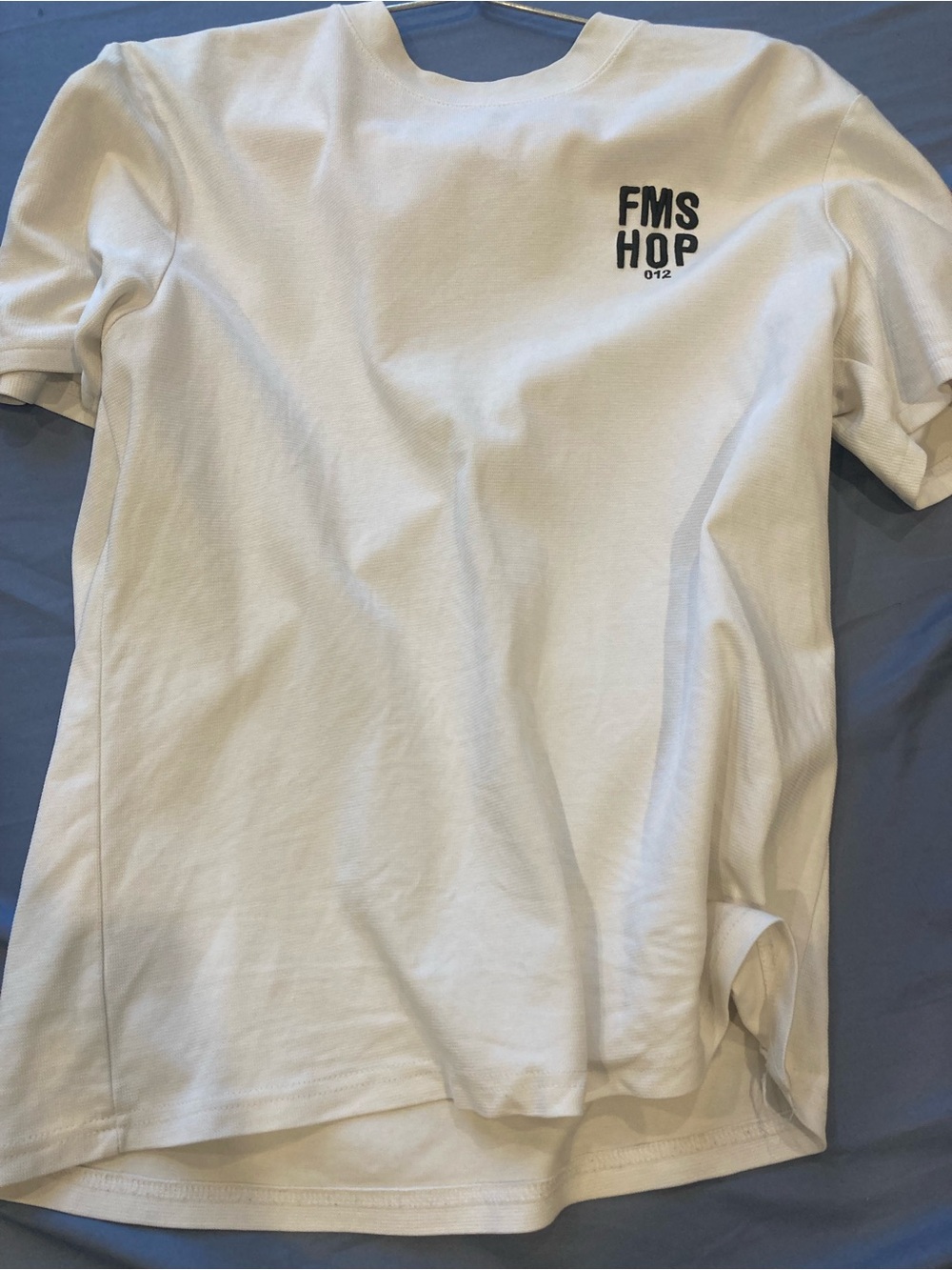 White Short Sleeve Tee with Small Black Chest Logo